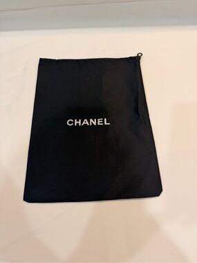 CHANEL Black Pouch with White Logo